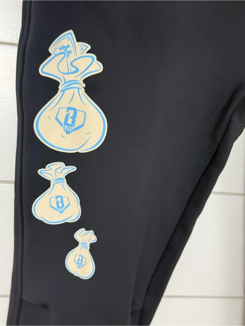 Black Kids Joggers with Light Blue Badge Accents